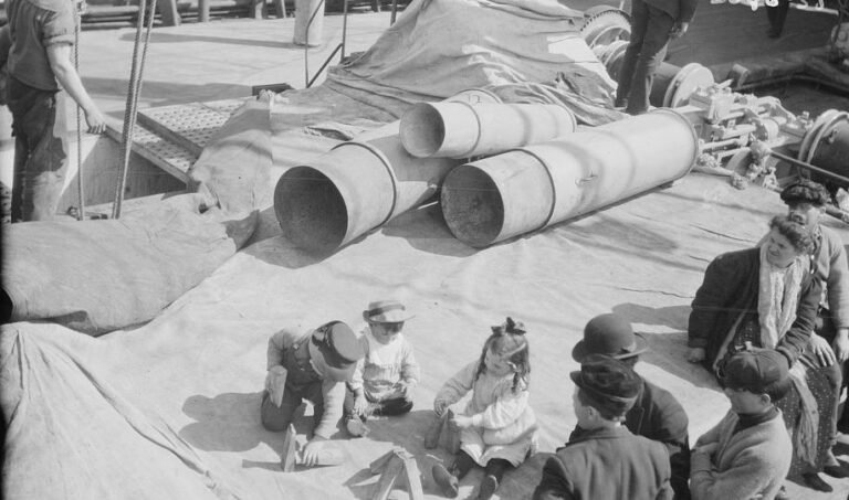 Steerage children playing on the deck of an ocean liner
