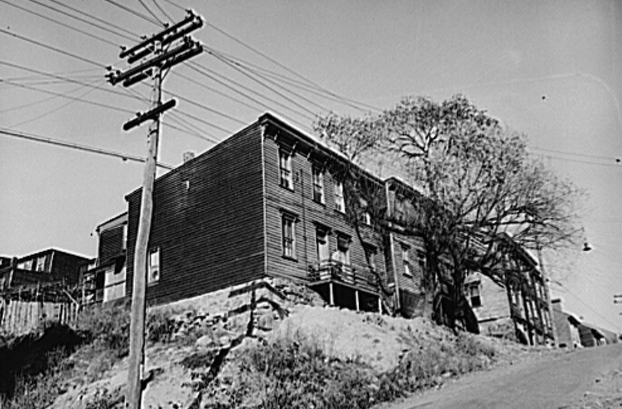 Row of wooden miners' houses on a street in Shenandoah, Pennsylvania, 1938