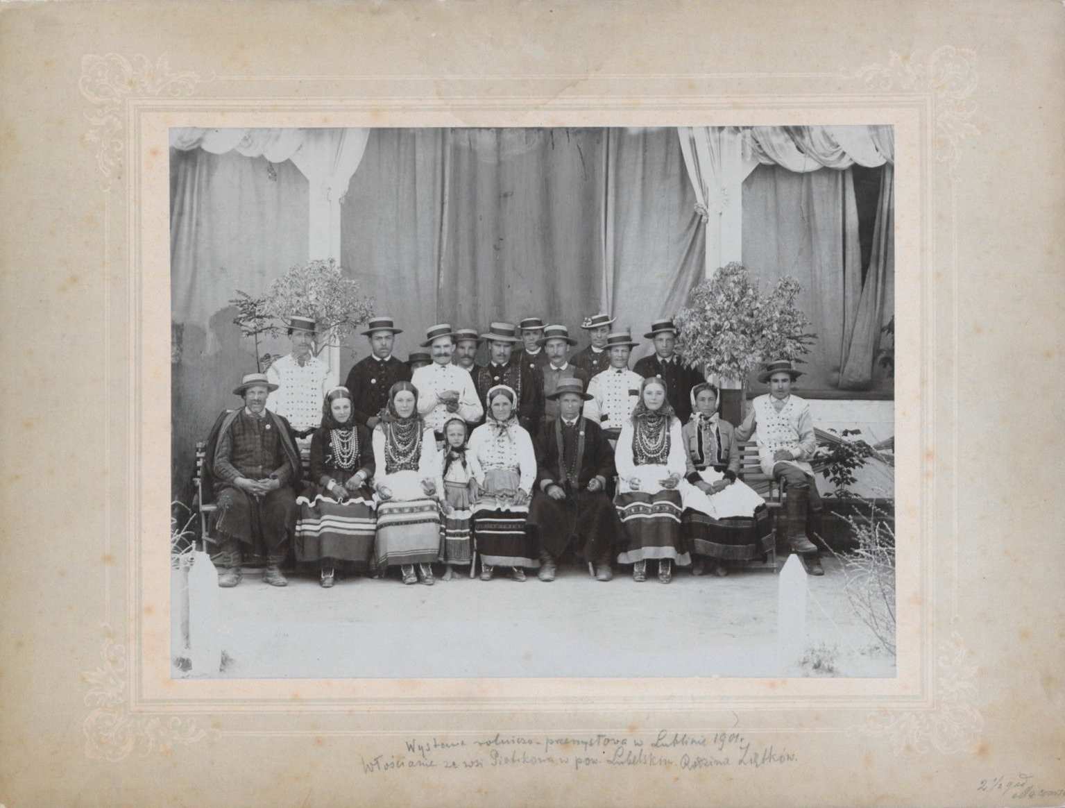 Group portrait of 21 members of the Ziętek peasant family in regional dress, Lublin 1901