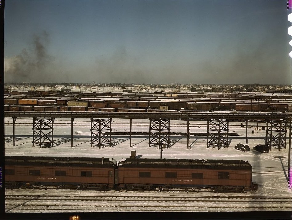 Chicago and North Western railroad classification yard with old boxcars used as housing, 1942